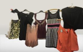 A large collection of clothing in various sizes, colours and styles