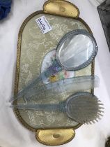A vintage style dressing table set with decorative flower design