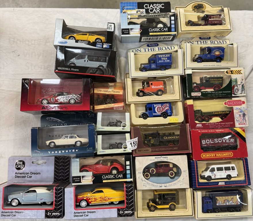 A quantity of mixed boxed diecast including Lledo, Auto art, Oxford diecast etc