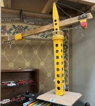 A large vintage hand made wooden crane. Height 82cm