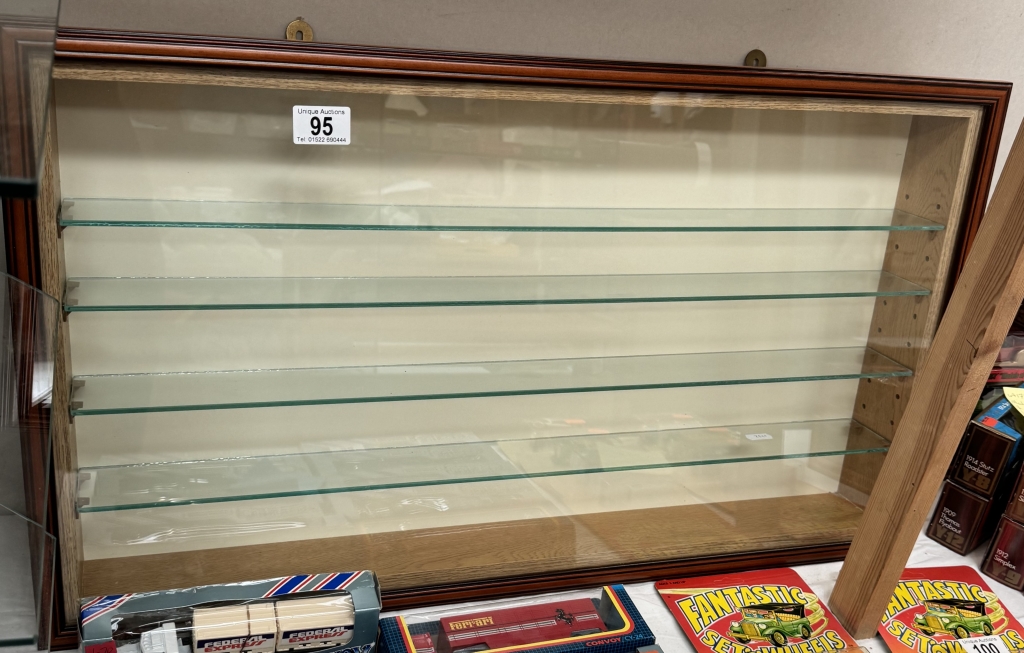 A model collectors display cabinet shelf. Shelf Width 70cm, Depth 7cm, Height 37.5cm. Overall W76.