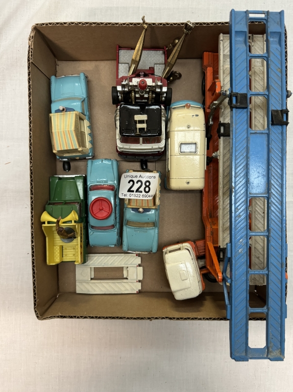 An unboxed Corgi tri-deck car transporter, Thames ice cream vans, Holmes wrecker etc