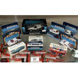 9 Ford Sierra models and Metro models by Matchbox and Corgi in blister packs and boxes
