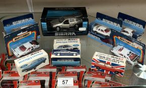 9 Ford Sierra models and a Metro models by Matchbox and Corgi in blister packs and boxes
