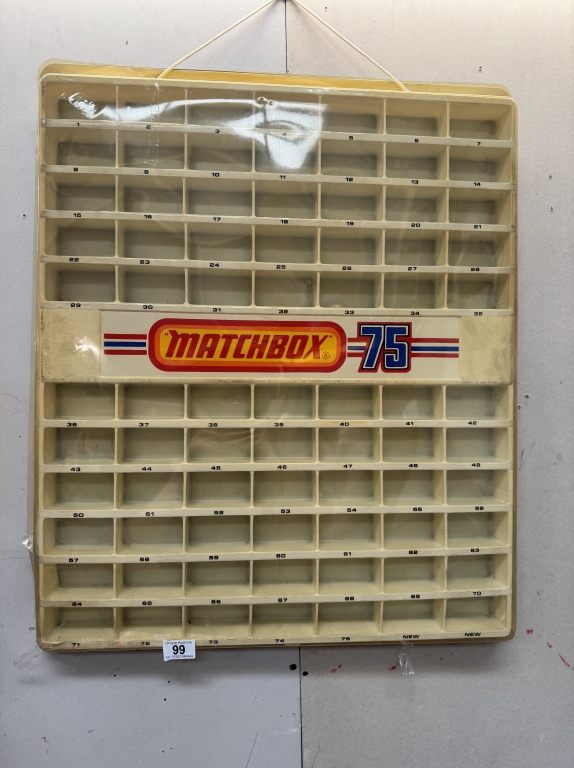 A Matchbox 75 shop plastic wall display cabinet