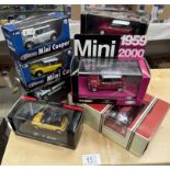 A quantity of boxed Mini's by various makers including Vanguards, Corgi, High speed etc