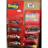 7 Matchbox Dinky toys on blister cards