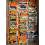 A box of Matchbox cars in blister packs