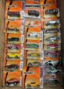 A box of Matchbox cars in blister packs