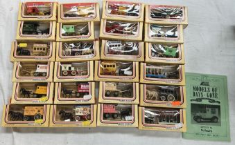 A large box of Lledo horse drawn vehicles