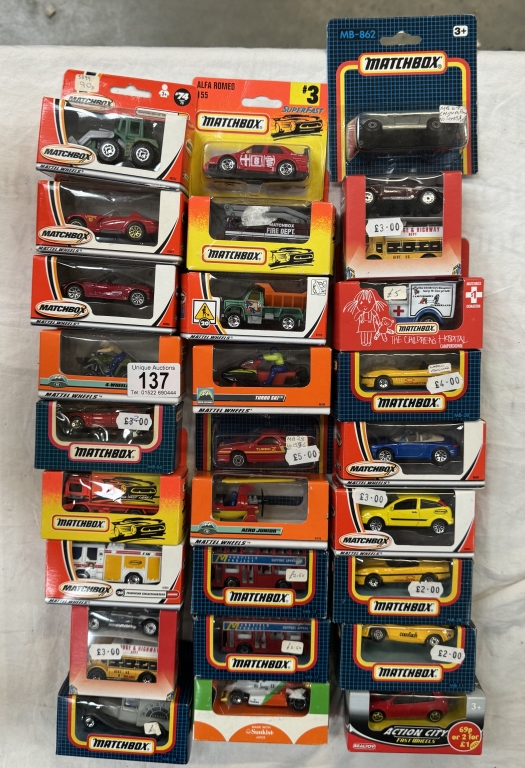 A large box of Matchbox models