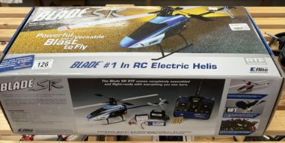 A boxed E-flite Blade SR radio control helicopter. Untested