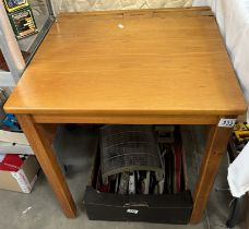 A vintage wooden school desk