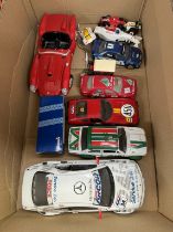 A box of loose mixed scale and maker diecast and plastic vehicles including Hornby Hobbies slot