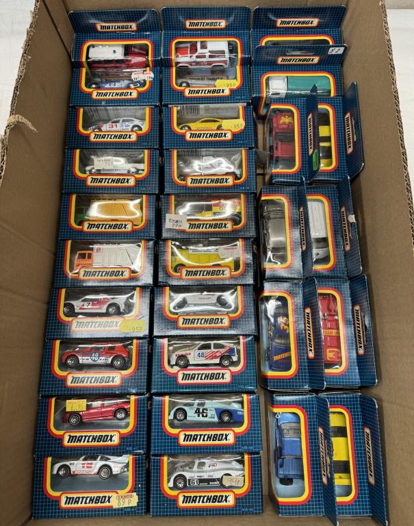 30 boxed Matchbox cars in blue boxes