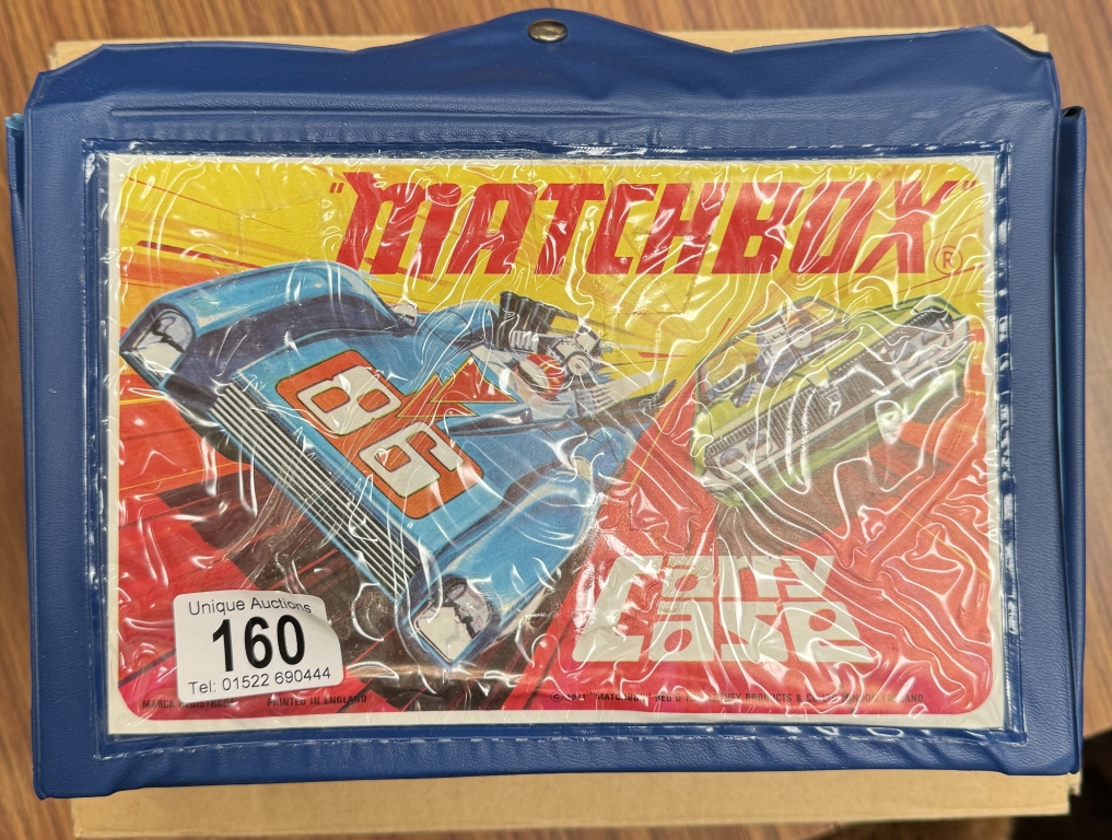 A Matchbox carry case & A Mattel Matchbox empty trade box