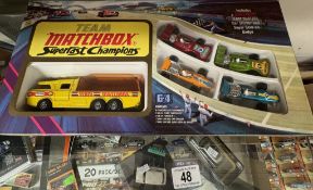 A boxed team Matchbox Superfast champions G4 gift set (box cellophane missing)
