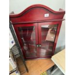 A dark wood stained collectors display cabinet. Height 86cm, Width 55cm, Depth 15cm