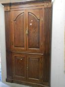 An early Georgian oak corner cupboard, COLLECT ONLY.