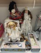 A collection of dolls including boxed Leonardo, Hansel & Grettel (Hummel Style), Black doll etc