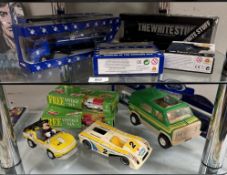 A selection of boxed Corgi & Lledo Co-Op & Milk themed diecast vehicles.