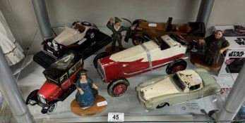 A mixed lot of tinplate, diecast etc including Burago, Wooden tourer, Robin Hood figures etc