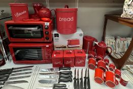 A quantity of red kitchenware including Microwave, grill, toaster etc & A quantity of Nescafe