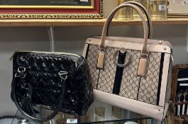A Black Betsey Johnson ladies bag & A River Island bag. Both in excellent condition.