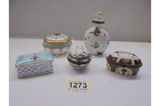 Four porcelain pill/trinket boxes and a porcelain scent bottle. - Image 1 of 6