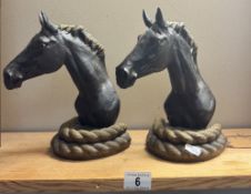 A pair of large cast iron horse door stops / book ends
