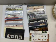 A collection of Royal Mail presentation packs, Many 1st class. Well over £200 in face value