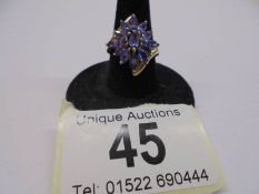 A 9ct gold tanzanite large cluster ring, size L half, 2.99 grams.