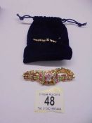 A Butler & Wilson crystal art deco style fan link bracelet in yellow metal.