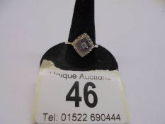 A 9ct gold tanzanite cluster ring, size O, 1.95 grams.