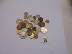 A small lot of UK and foreign coins.