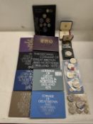 A quantity of coins including 8 coinage of UK sets, uncirculated coin sets & Crowns etc.