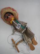 A Mexican man string puppet.