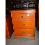 A three drawer bedside chest. COLLECT ONLY.