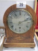 A nice oak cased mantle clock in working order.