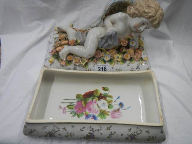 A porcelain trinket pot with cherub on lid. - Image 4 of 4
