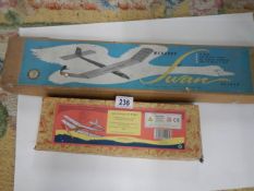 Two vintage model aircraft kits.