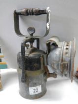 An old hand lamp, in good condition.