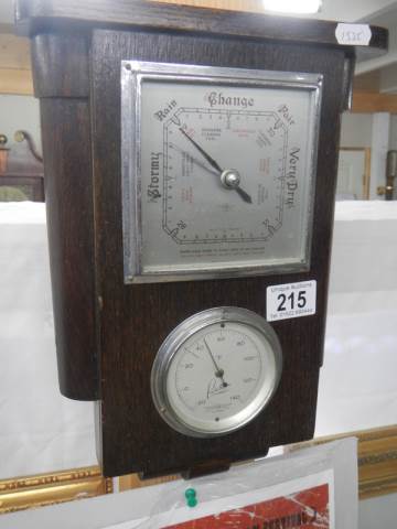 A vintage barometer/thermometer.