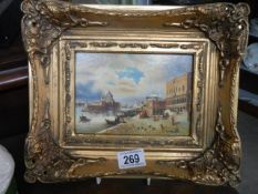 A gilt framed Venetian scene.
