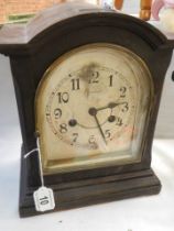 A mid 20th century mantle clock, in working order.