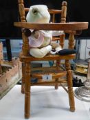 A painted doll's high chair with a Beatrix Potter frog. COLLECT ONLY.