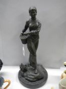 A Chinese bronze female figure.