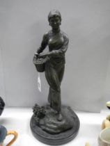 A Chinese bronze female figure.