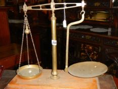 A set of brass balance scales.