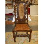 An old carved chair with cane seat and back, COLLECT ONLY.